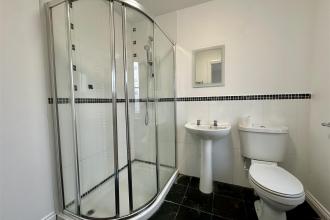 EN-SUITE SHOWER ROOM